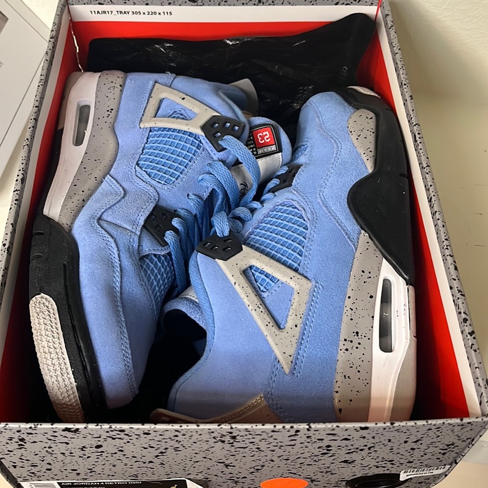 Air Jordan 4 Retro,University Blue/Black.Worn Once
